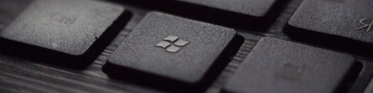 Close-up of computer keyboard, specifically drawing attention to the Windows key